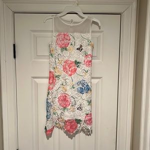 Girls Blush dress. White lace with floral print . Size 10.